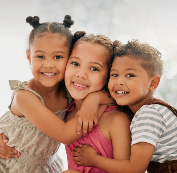Happy children smiling during a visit to Newark Smiles Dental