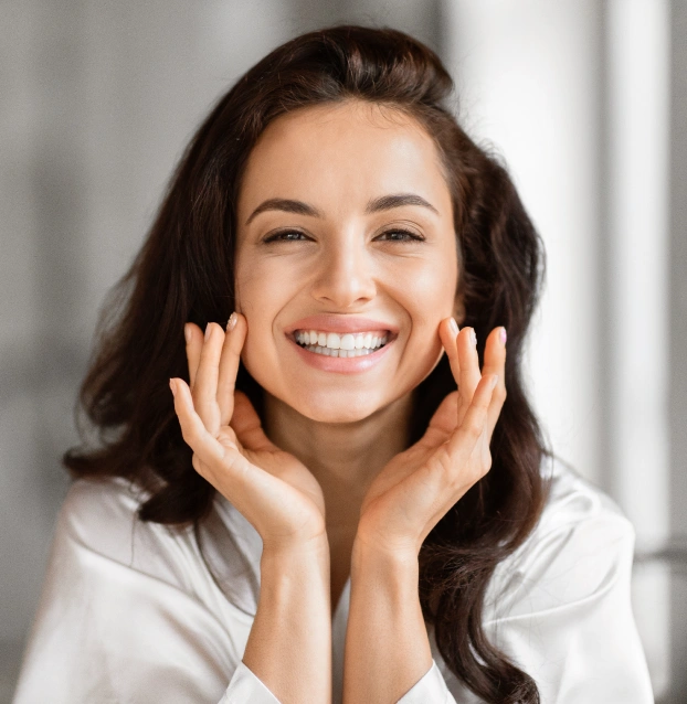Gum contouring treatment to reshape uneven gum tissue
